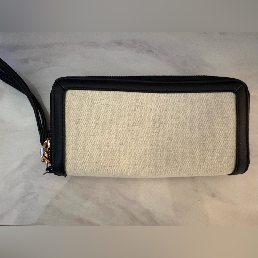 A New Day Cream Wristlet